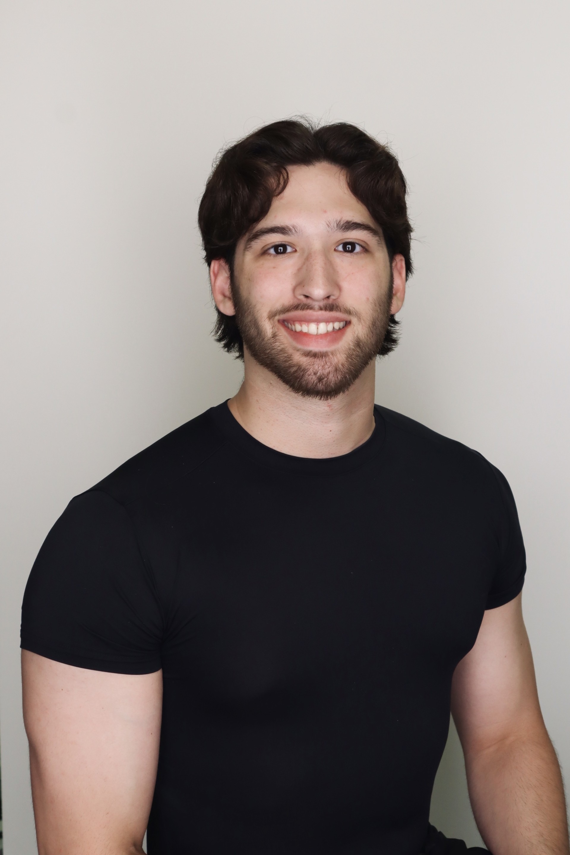 Professional headshot of David Gusmao